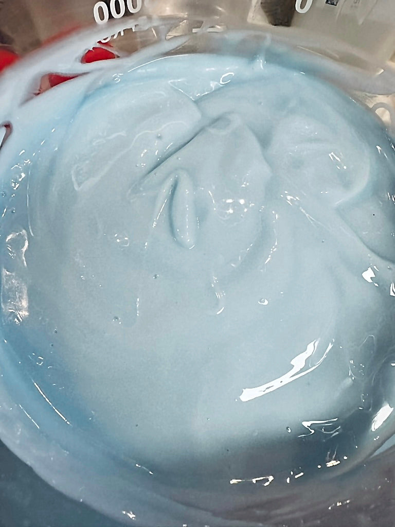 Keys Marine Glow Gel Mask in a beaker in the lab