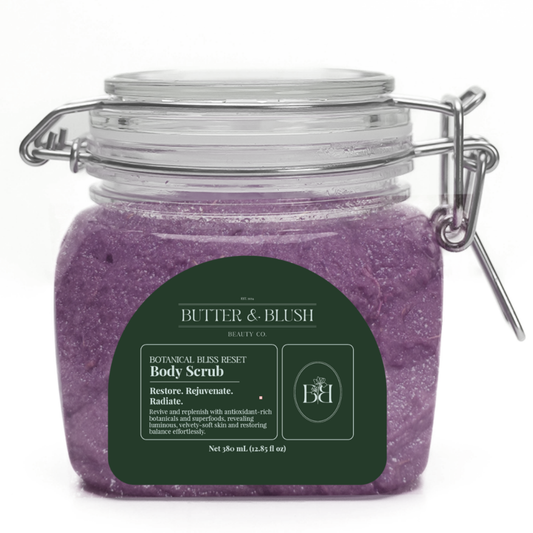 Botanical Bliss Reset Body Scrub in a clamp-lid jar of violet-purple scrub